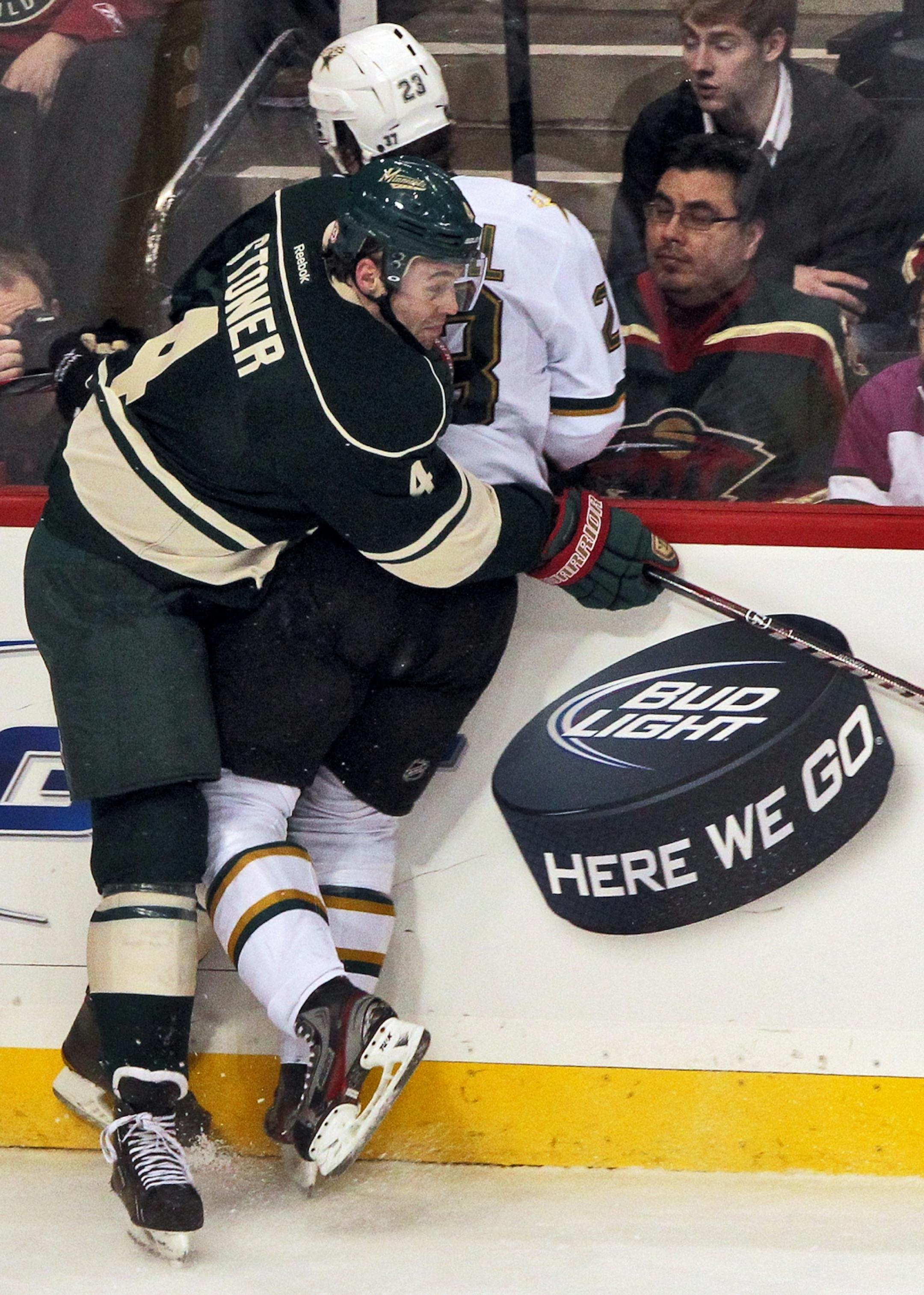 Wild defenseman Clayton Stoner (left)