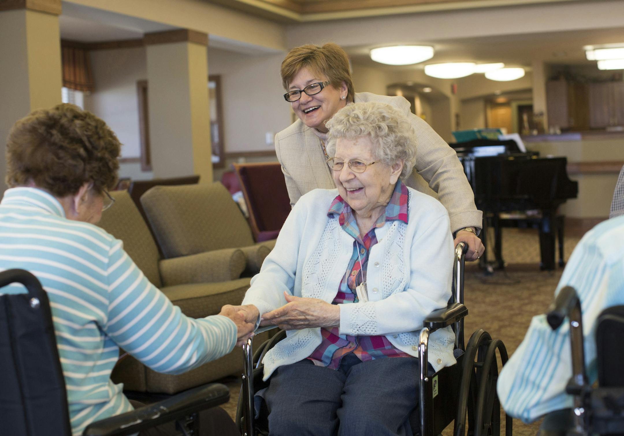 Cindy Klein, back, administrator of the Cottages at Hillcrest Country Estates near Omaha, Neb. Hillcrest houses 1,000 seniors and is an Ecolab customer.