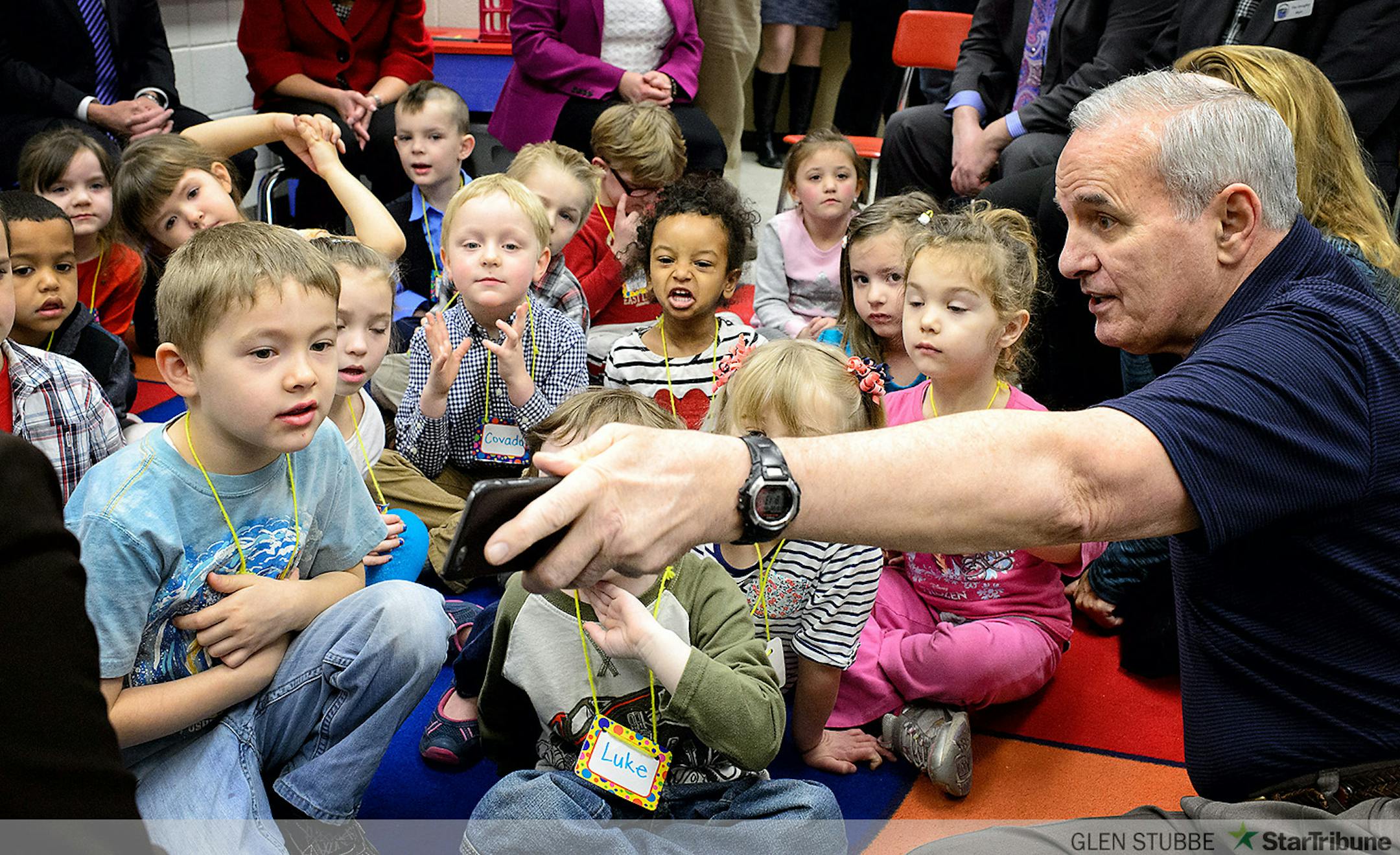 Governor Dayton showed the Pre K class photos of his dogs chewing on the frisbees he threw to them.           ] GLEN STUBBE * gstubbe@startribune.com  Friday, March 20, 2015  Governor Mark Dayton, Education Commissioner Brenda Cassellius, and area legislators will visit a preschool classroom at Newport Elementary School.  Senator Katie Sieben, Senator Susan Kent, and Representative Dan Schoen, visited with preschool students, teachers, and parents, and discuss the impact of their proposal to send every Minnesota four-year-old to preschool.