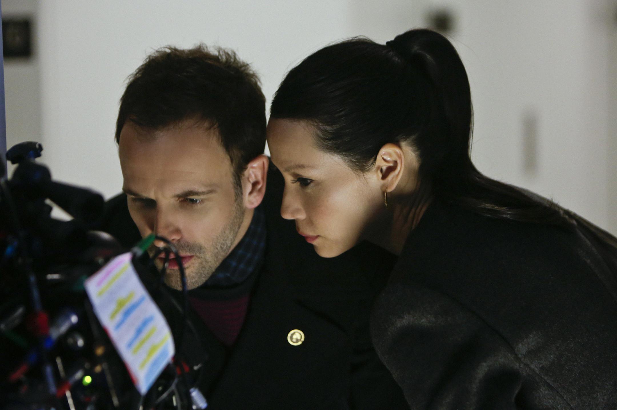"The Red Team" While on suspension from the NYPD, Sherlock (Jonny Lee Miller) and Watson (Lucy Liu) investigate a suspicious hit and run car accident involving a conspiracy theorist, on ELEMENTARY, Thursday, Jan 31 (10:00-11:00 PM, ET/PT) on the CBS Television Network. Photo: Patrick Harbron /CBS ©2012 CBS Broadcasting, Inc. All Rights Reserved