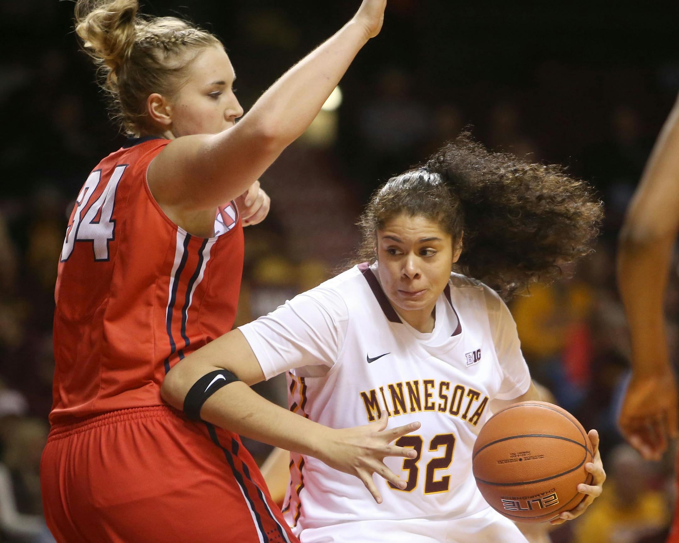 University of Minnesota‚Äôs Amanda Zahui B. (32) drives the lane against Liberty 's Katelyn Adams (34) during the second half of the first round of the Subway Classic women‚Äôs basketball tournament Saturday, Dec. 20, 2014, at Williams Arena on the University of Minnesota campus in Minneapolis, MN. Minnesota beat Liberty 74-60.](DAVID JOLES/STARTRIBUNE)djoles@startribune.com University of Minnesota‚Äôs vs. Liberty in the first round of the Subwa