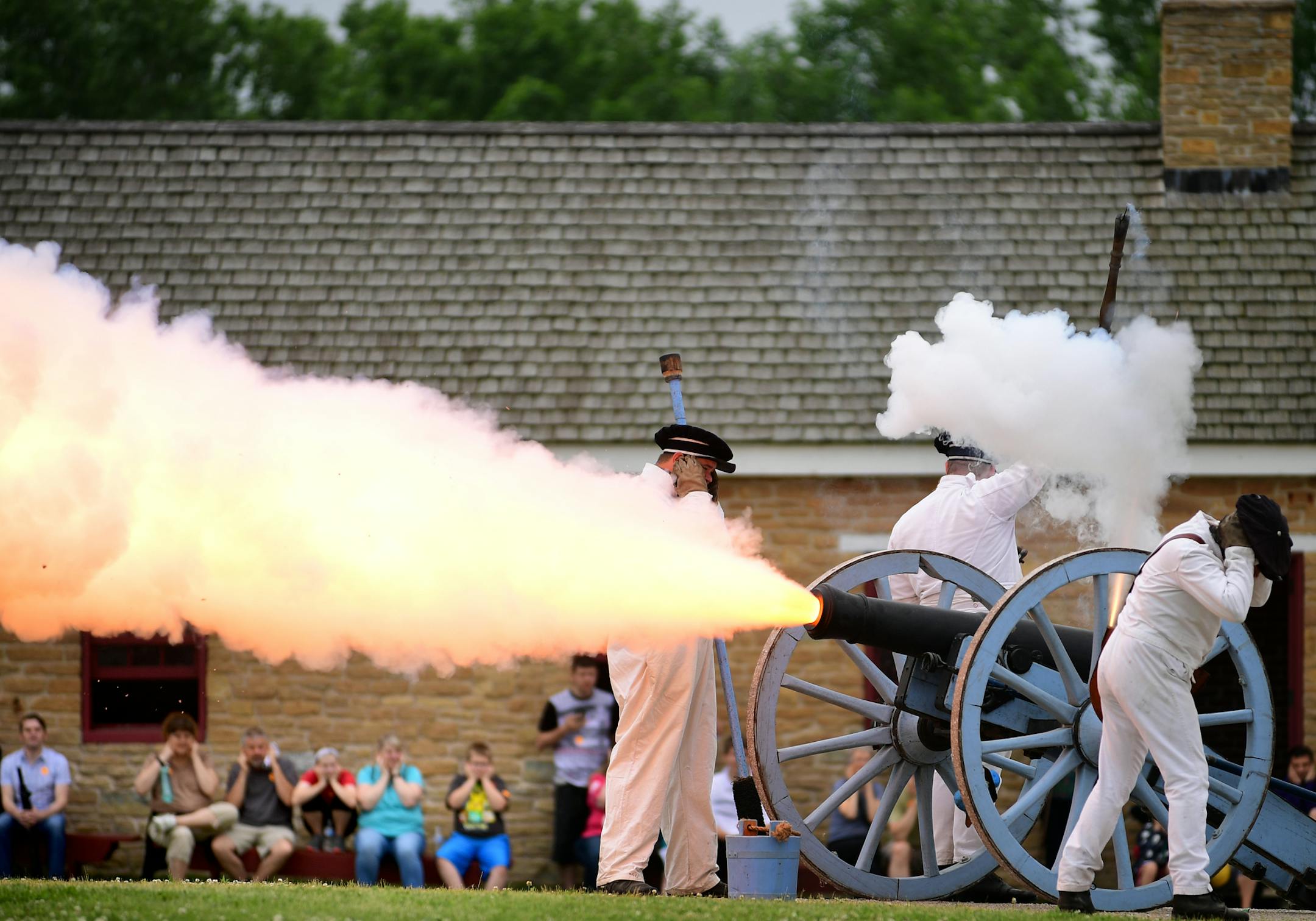 19th Century period actors fired a six pound field piece canon during an artillery demonstration at Historic Fort Snelling Saturday afternoon. ] (AARON LAVINSKY/STAR TRIBUNE) aaron.lavinsky@startribune.com Historic Fort Snelling opened for the season on Saturday, May 28, 2016 in the Unorganized Territory of Fort Snelling, Minn.