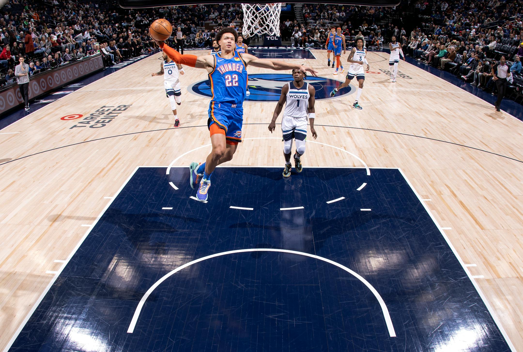 Isaiah Roby (22) of the Oklahoma City Thunder goes up for a dunk in the first half.