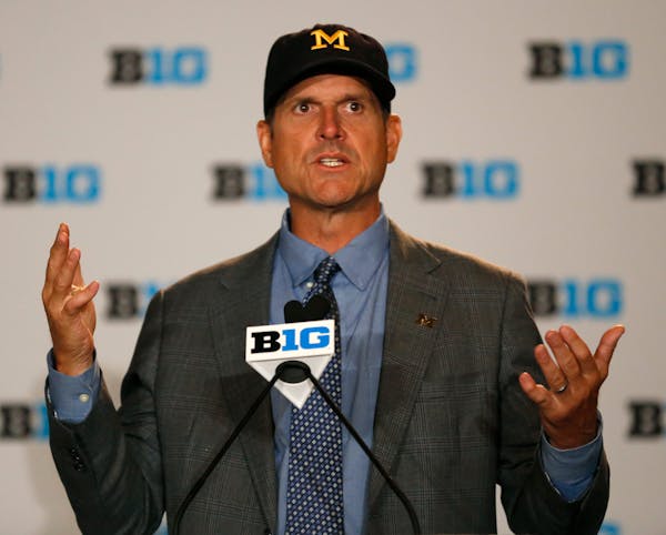 Michigan football coach Jim Harbaugh spoke to the media at Big Ten media days Monday in Chicago.
