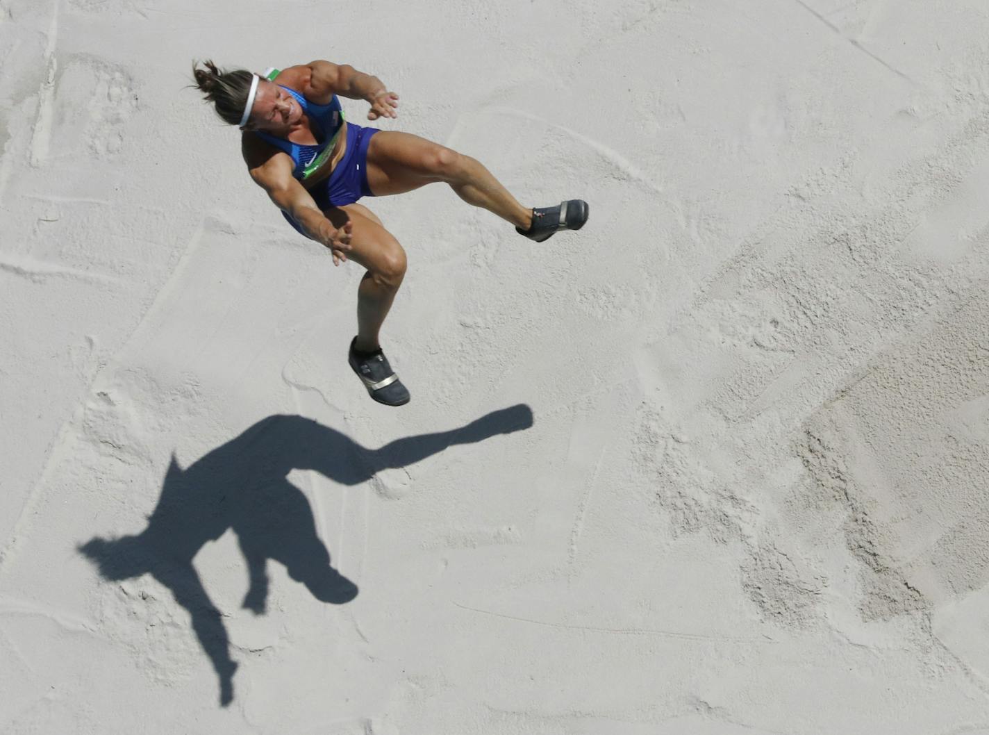 United States' Heather Miller-Koch competes in the long jump in the heptathlon during the athletics competitions of the 2016 Summer Olympics at the Olympic stadium in Rio de Janeiro, Brazil, Saturday, Aug. 13, 2016. (AP Photo/Morry Gash)