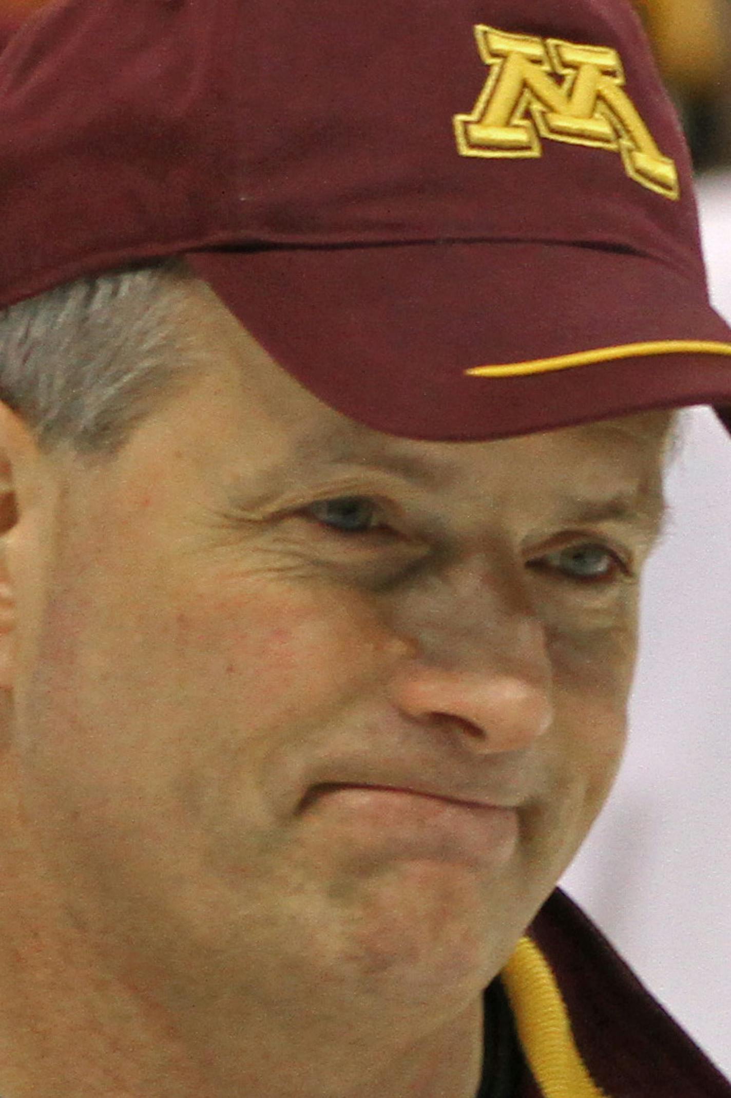 NCAA Frozen Four Regionals, Mens Hockey practice, 3/23/12.] (right) Gophers Hockey Coach Don Lucia skated away as Minnesota gathered at center ice at the end of their practice at the Xcel Center Friday afternoon.] Bruce Bisping/Star Tribune bbisping@startribune.com Don Lucia/roster. ORG XMIT: MIN2012101820160995