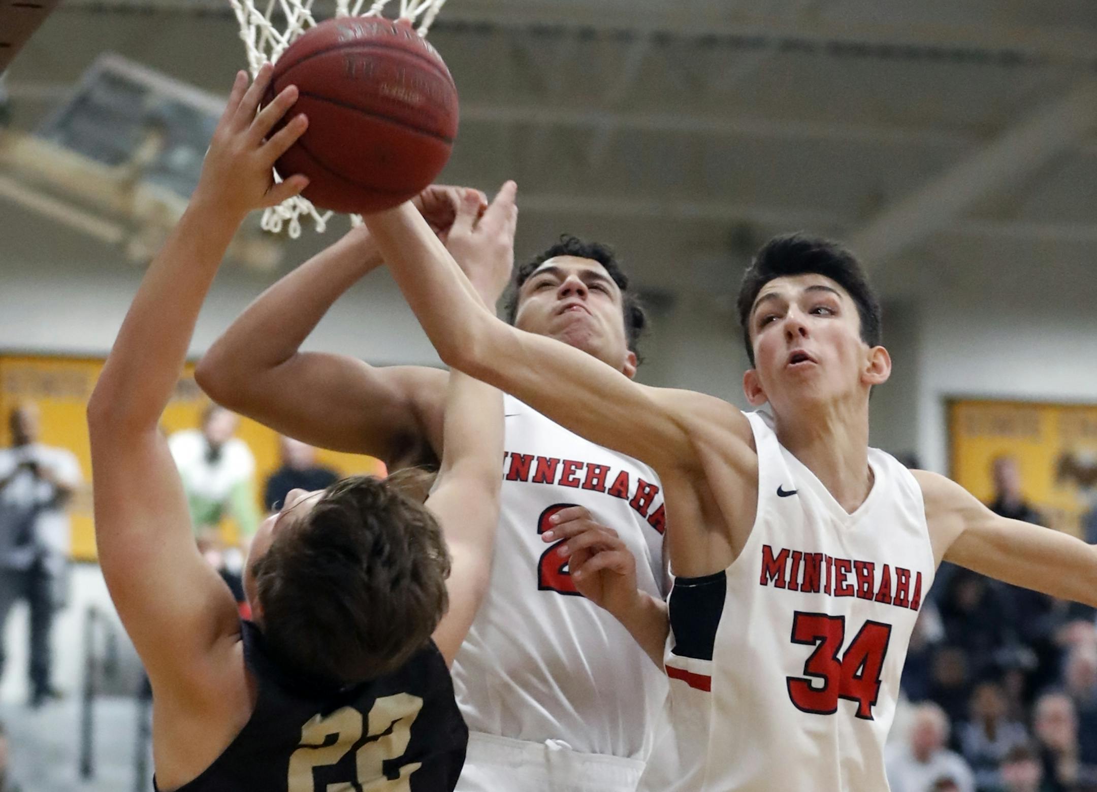 Zach Korba(22) is blocked by Chet Holmgren(34) of Minnehaha.