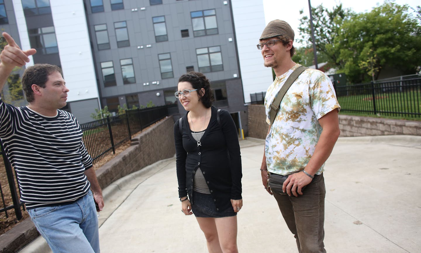 Greg Foley, asset manager, talked with Hans Early Nelson and his girlfriend Liz Parent after they toured their new apartment building for artists Jackson Flats in Minneapolis Thursday September 19, 2013. ] (KYNDELL HARKNESS/STAR TRIBUNE) kyndell.harkness@startribune.com