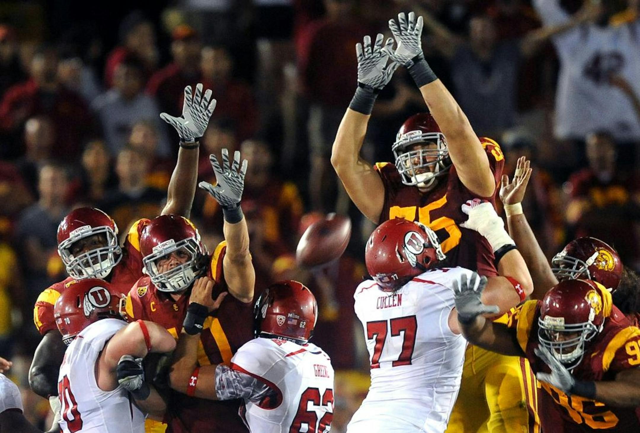 USC offensive lineman Matt Kalil (center) has decided to forgo a final season with the Trojans and will make himself available for the NFL draft, Kalil said Thursday night.