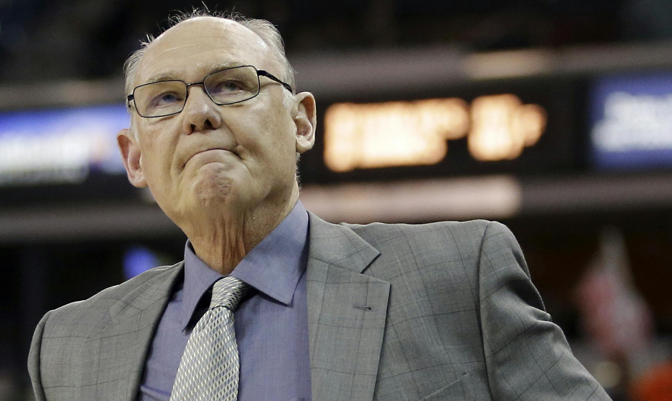 Sacramento Kings head coach George Karl grimaces during the first half of an NBA basketball game against the San Antonio Spurs in Sacramento, Calif., Monday, Nov. 9, 2015.
