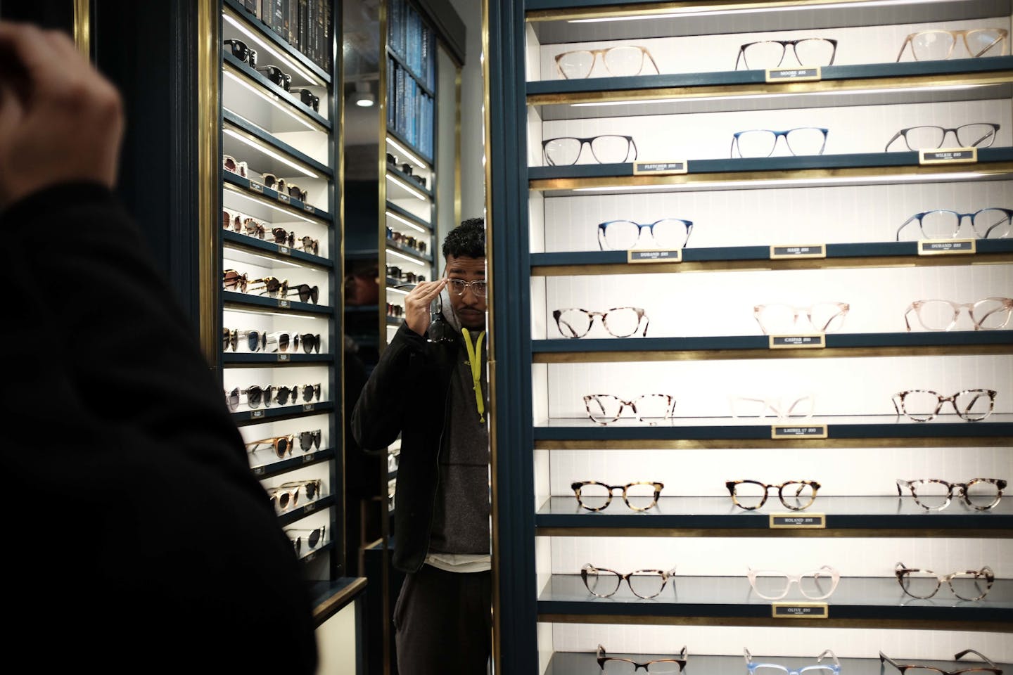 Abdi Farah, of south Minneapolis, tried on glasses at Warby Parker inside of Askov Finlayson Saturday afternoon. ] (AARON LAVINSKY/STAR TRIBUNE) aaron.lavinsky@startribune.com Nicollet Mall is a monument to the titans that once ruled retail -- department stores (Macy's) and bookstores (Barnes & Noble) -- that are now shuttering. Meanwhile, a glimpse of the future of retail can increasingly be found nearby in the North Loop. That's where Bonobos has recently opened its first Minnesota location. I