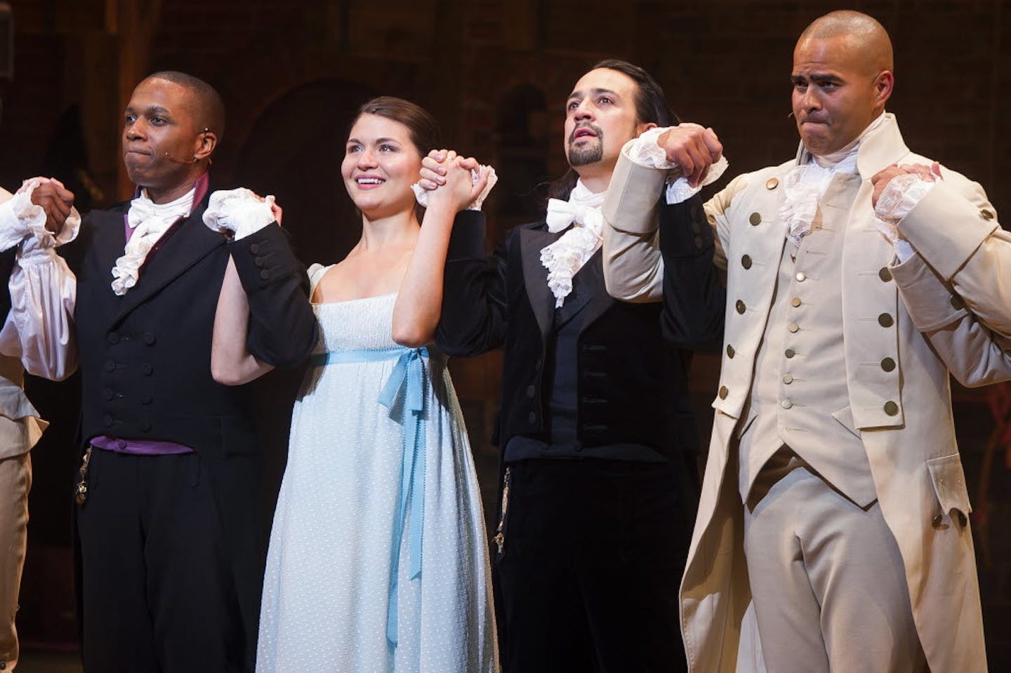 In this Thursday, Aug. 6, 2015, file photo, Leslie Odom Jr., from left, Phillipa Soo, Lin-Manuel Miranda and Christopher Jackson appear at the curtain call following the opening night performance of "Hamilton" at the Richard Rodgers Theatre in New York.