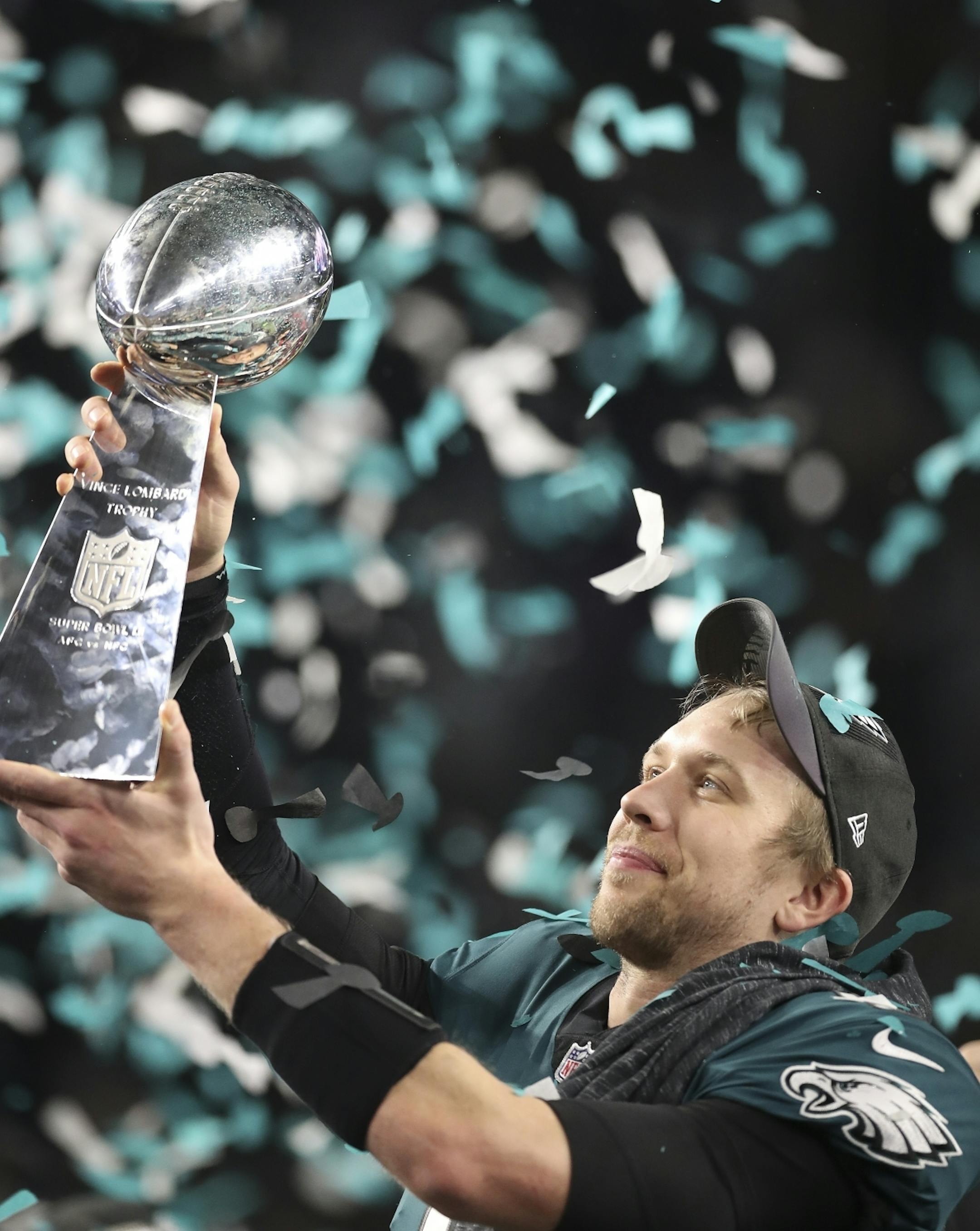 As confetti floated down at U.S. Bank Stadium, Philadelphia Eagles quarterback Nick Foles lifted up the Vince Lombardi trophy after leading his team to a 41-33 victory over the New England Patriots. After taking over as starter in December after Carson Wentz was injured, and facing many doubters, he was named the game's MVP.