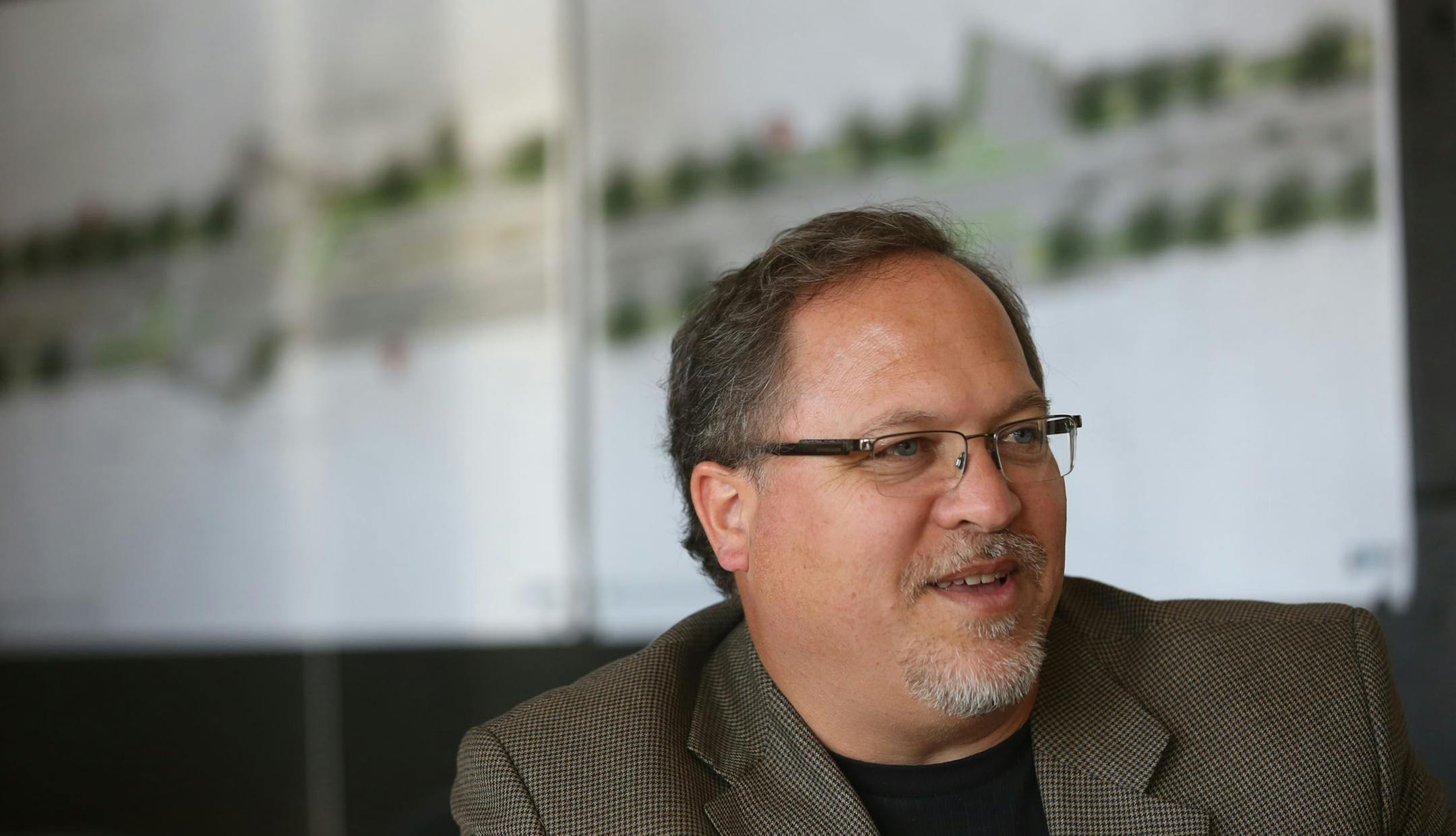 Michael Fischer, Minneapolis office leader of LHB Architects, talked about the features of their new office in the North Loop in Minneapolis, Tuesday October 1, 2013. ] (KYNDELL HARKNESS/STAR TRIBUNE) kyndell.harkness@startribune.com