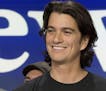 FILE - In this Jan. 16, 2018 file photo, Adam Neumann, co-founder and CEO of WeWork, attends the opening bell ceremony at Nasdaq, in New York. WeWork 