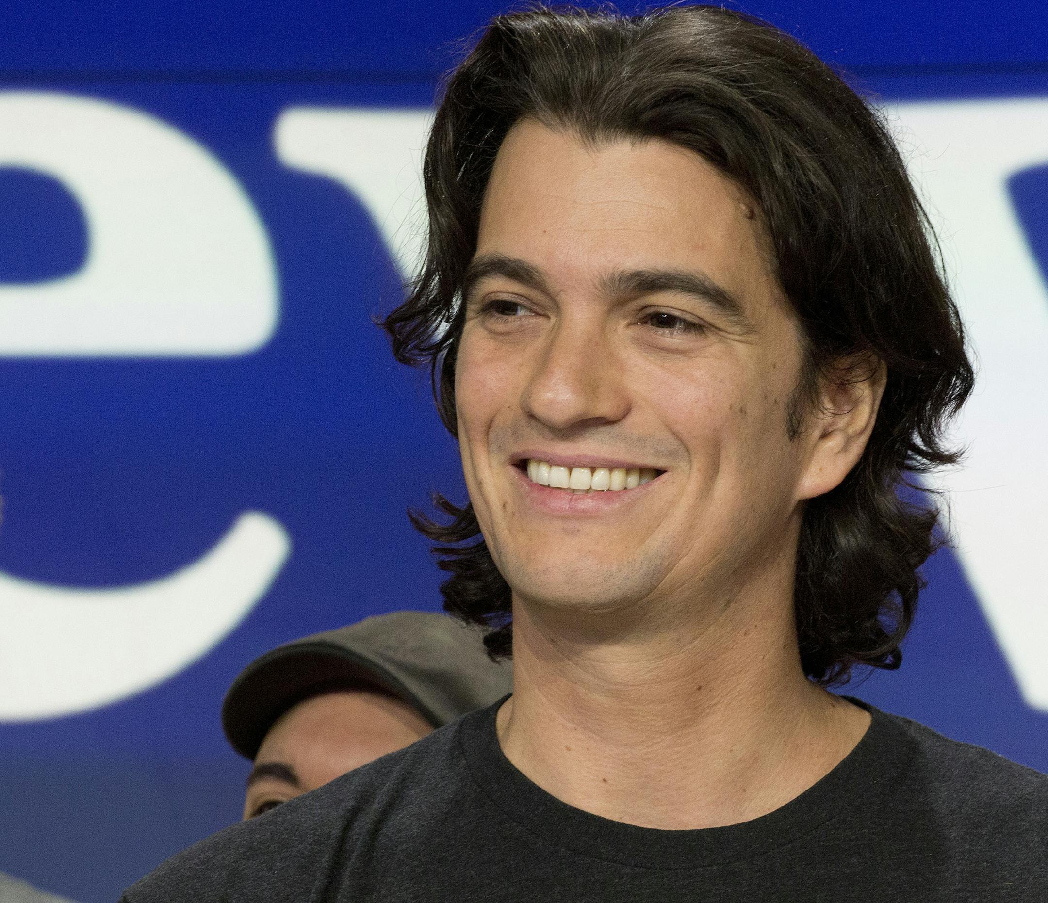 FILE - In this Jan. 16, 2018 file photo, Adam Neumann, co-founder and CEO of WeWork, attends the opening bell ceremony at Nasdaq, in New York. WeWork is delaying its IPO, saying it now expects the offering to be completed by the end of the year. The office-sharing company is hoping to restore investor confidence amid doubts about its ability to make money and decisions that’ve raised concerns about its CEO.