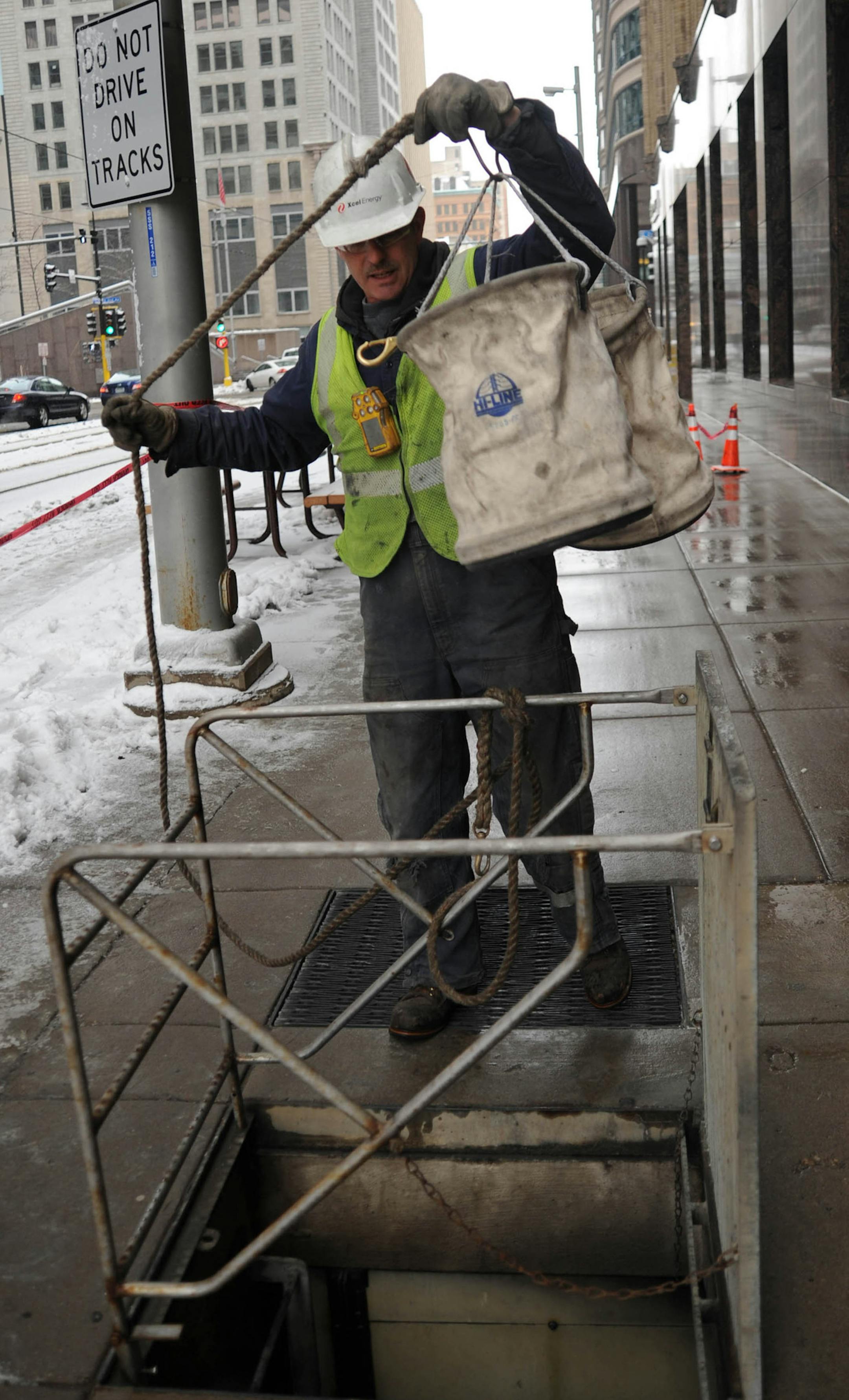 Part of downtown Minneapolis was without power, Tom Hunn, with Xcel Energy worked on the site of the transformer fire on 5th St. Electricity was out for more than 90 minutes Friday morning in several blocks of downtown Minneapolis, darkening City Hall and police headquarters, officials said. Offices went dark at about 6:20 a.m., and power was restored to all customers at 7:55 a.m., an Xcel Energy spokesman said. The affected area was mainly east of Marquette Av. and near 5th St. Signal lights we