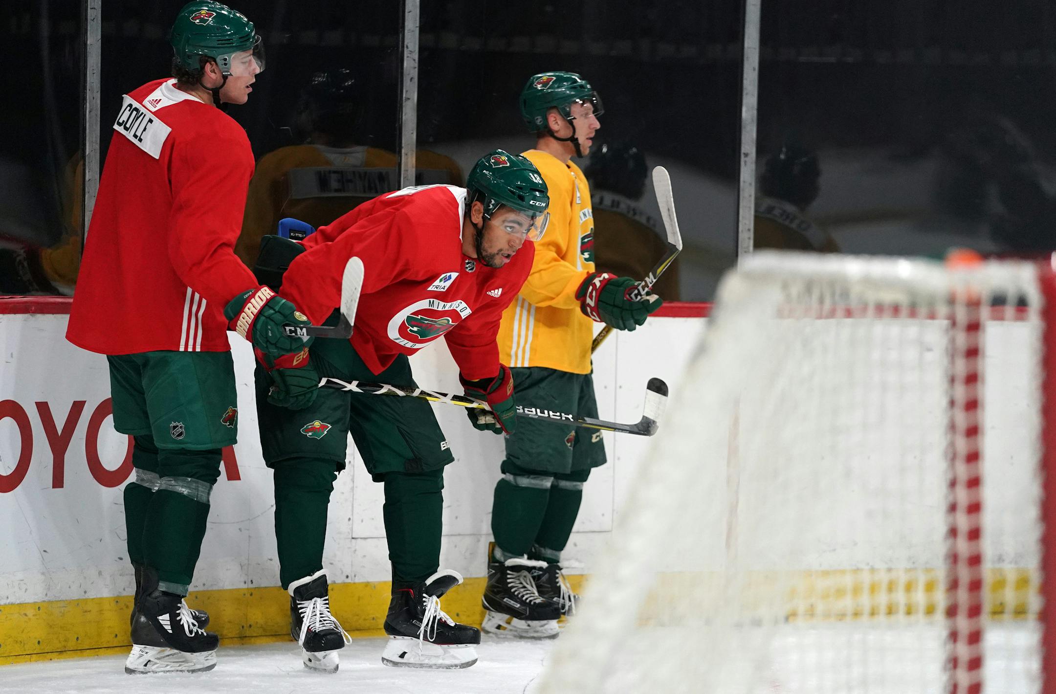 Minnesota Wild center Charlie Coyle (3) and Minnesota Wild left wing Jordan Greenway (18) waited between drills. ] ANTHONY SOUFFLE &#xef; anthony.souffle@startribune.com Players and coaches took part in the first day of the Minnesota Wild training camp Friday, Sept. 14, 2018 at the Xcel Energy Center in St. Paul, Minn.