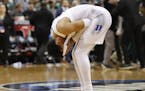 Duke guard Tre Jones covers his face after losing to Michigan State in the NCAA men's East Regional final college basketball game in Washington, Sunda