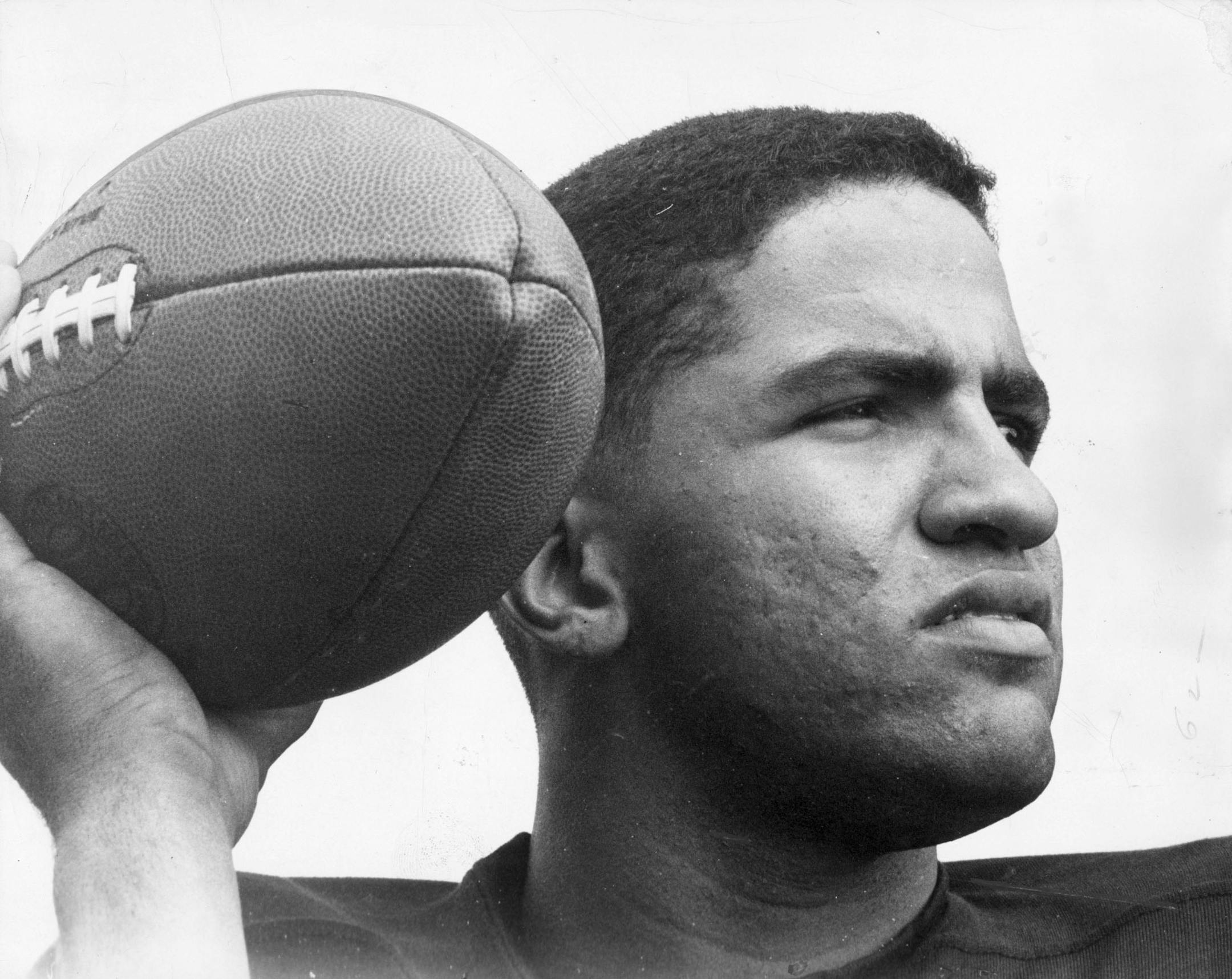 Iowa&#x2019;s Wilburn Hollis and the Gophers' Sandy Stephens challenged the existing prejudice against black quarterbacks when they led their teams into a game for the 1960 national title. Star Tribune file photos