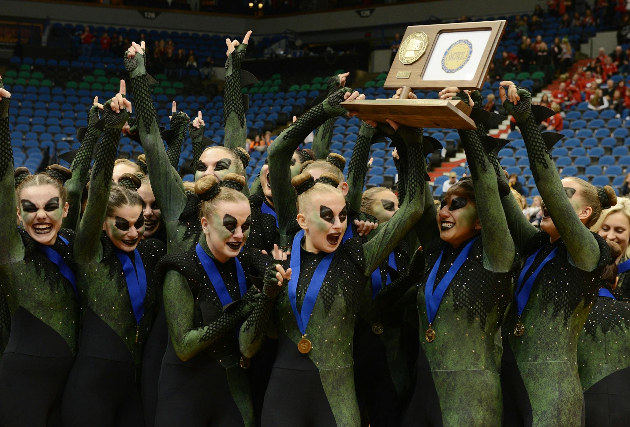 The Faribault Emeralds celebrated their announcement of first place in the Class 3A dance team tournament in February at Target Center.