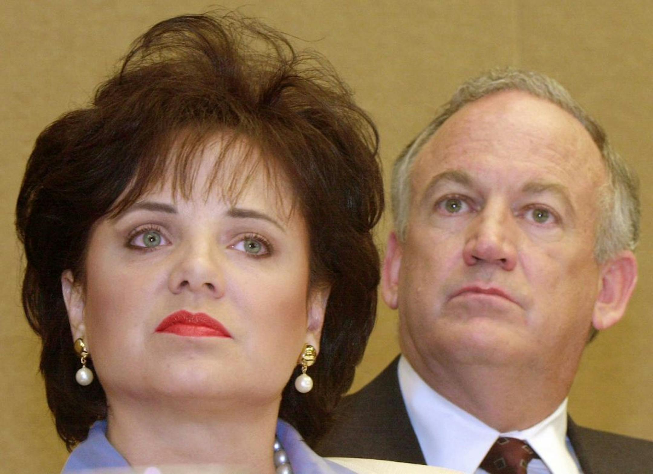 FILE - In this May 24, 2000 file photo, Patsy Ramsey and her husband, John, parents of JonBenet Ramsey, look on during a news conference in Atlanta regarding their lie-detector examinations for the murder of their daughter.