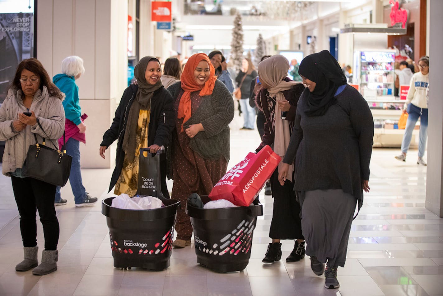 Isnino Jimale and Ayni Shardi of Faribault and Roda Farah and Nora Shardi of Burnsville shopped at Mall of America on Black Friday 2018.