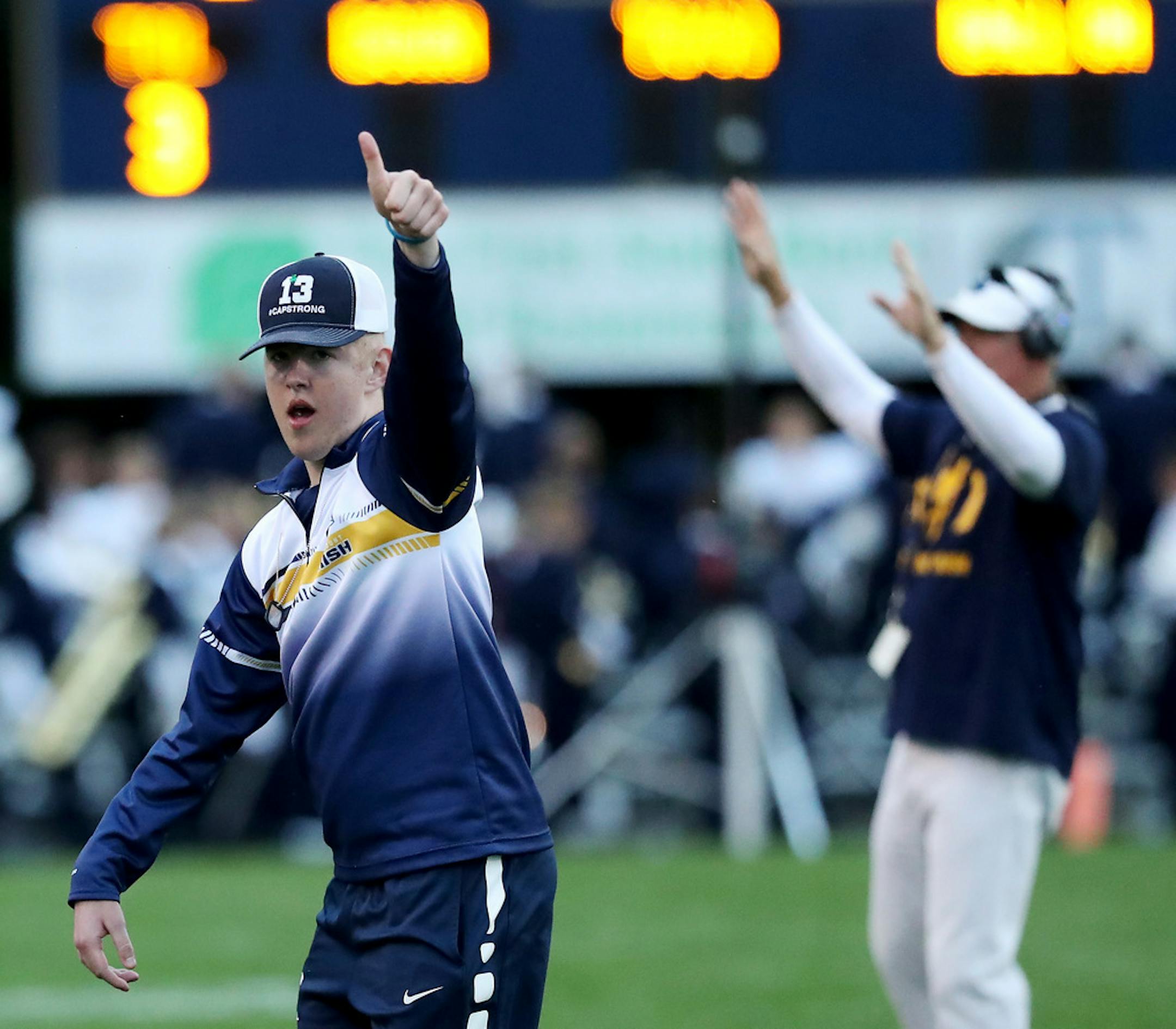 Rosemount High receiver Cap George, who was honored before the game, game a thumbs up before their game with Lakeville North High Friday, Sept. 13, 2019, at Rosemount High in Rosemount, MN.]
