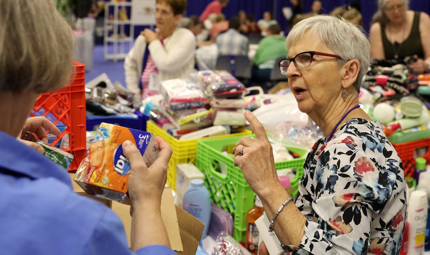 LeeAnn Baker from Marcell, Minn., right, and Marilyn Martell from Mason City, Iowa, left, helped fill bags with toiletry items to be given to people in need as they participated in special volunteer projects. ] ANTHONY SOUFFLE &#xef; anthony.souffle@startribune.com More than 3,000 Lutheran women from across the globe gathered at the Minneapolis Convention center this week for the triennial gathering of the Women of the Evangelical Lutheran Church of America Friday, July 14, 2017 in Minneapolis.