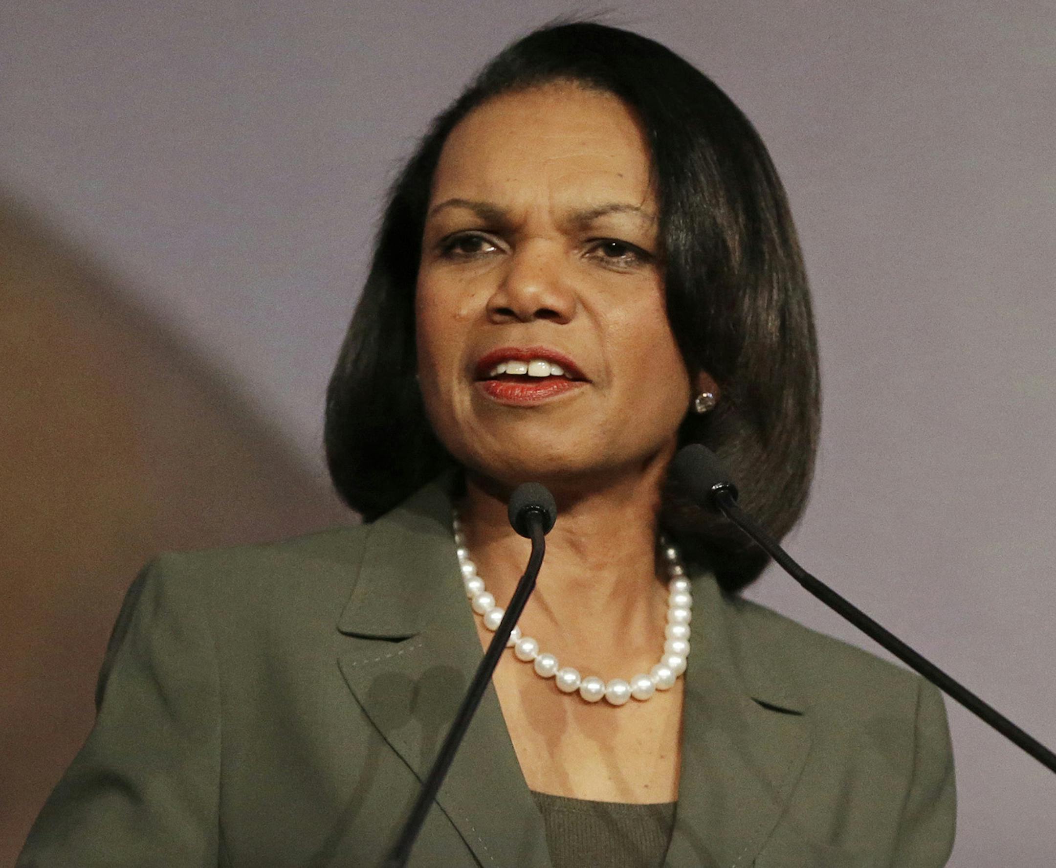 FILE - In this March 15, 2014 file photo, former Secretary of State Condoleezza Rice gestures while speaking at the California Republican Party 2014 Spring Convention in Burlingame, Calif. University of Minnesota faculty and student activists are pressuring the school to rescind its invitation to Rice to speak at the Twin Cities campus April 17 as part of the Humphrey School of Public Affairs‚Äô lecture series. Math professor William Messing has introduced a resolution to be con