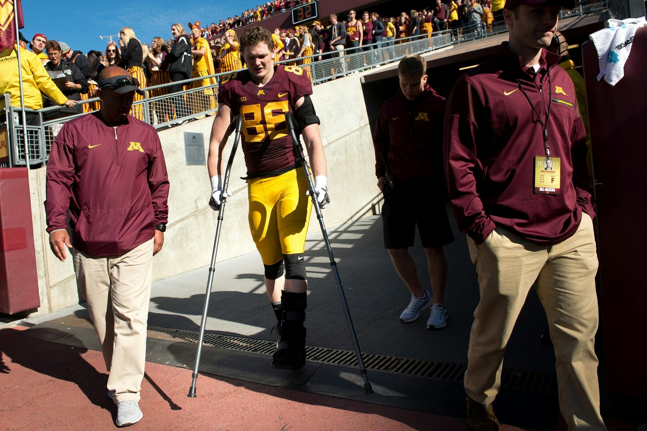 Gophers tight end Brandon Lingen (86) emerged from the locker room with a left lower leg injury suffered against Rutgers.