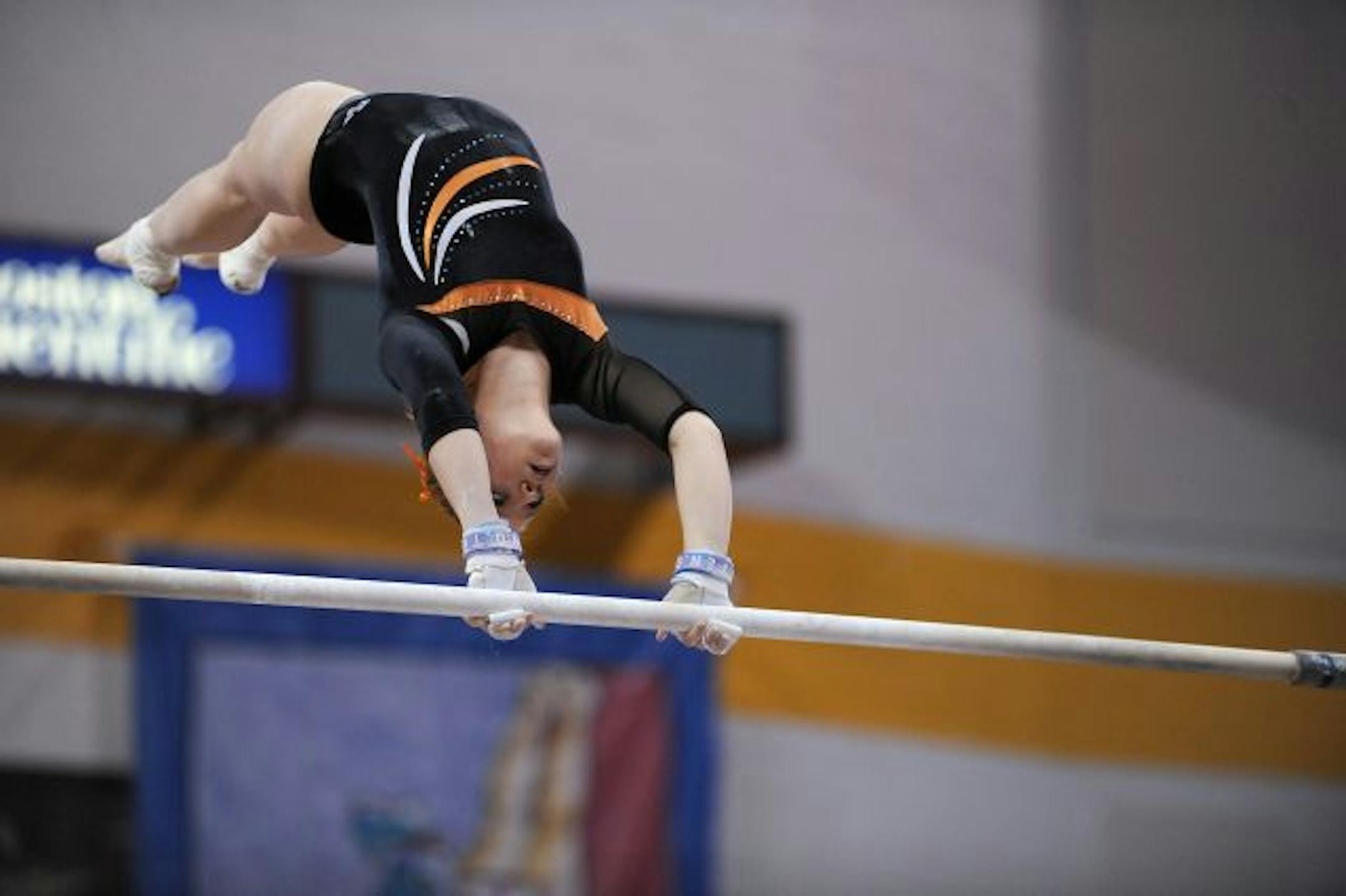Delano's Dabrina Rolf competed on the uneven parallel bars during a Minnesota State Girls Gymnastics tournament on February 25th at the Sports Pavilion in Minneapolis, Minn.