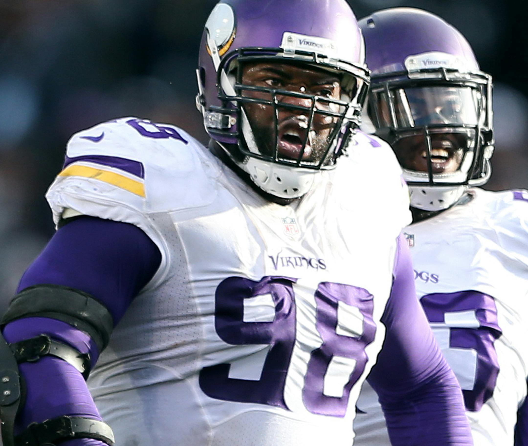 Minnesota Vikings defensive tackle Linval Joseph (98), and tackle Sharrif Floyd (73) celebrated after Joseph sacked Oakland Raiders quarterback Derek Carr (4) at the Oakland Coliseum Sunday November 15, 2015 in Oakland, CA.] The Minnesota Vikings beat at the Oakland Raiders 30-14 in the Coliseum. Jerry Holt/ Jerry.Holt@Startribune.com