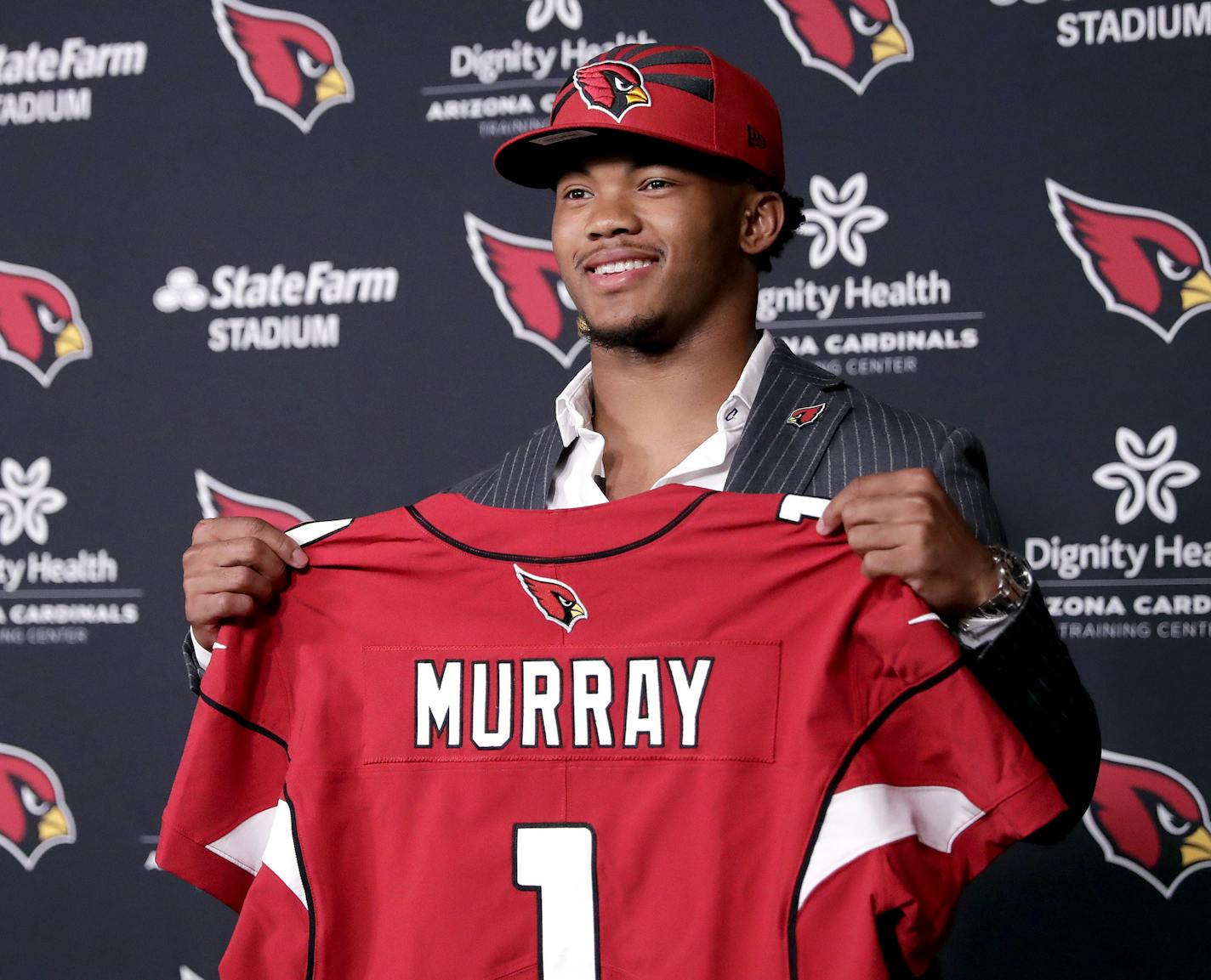 Arizona Cardinals NFL football quarterback Kyler Murray is introduced, Friday, April 26, 2019, at the Cardinals' practice facility in Tempe, Ariz. Murray was the first overall pick in the 2019 NFL Football draft. (AP Photo/Matt York)