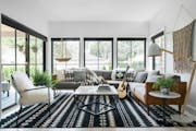 The crisp black-and-white palette in the family room of the Nordic-inspired modern farmhouse in Minneapolis, this year's HGTV Urban Oasis sweepstakes.
