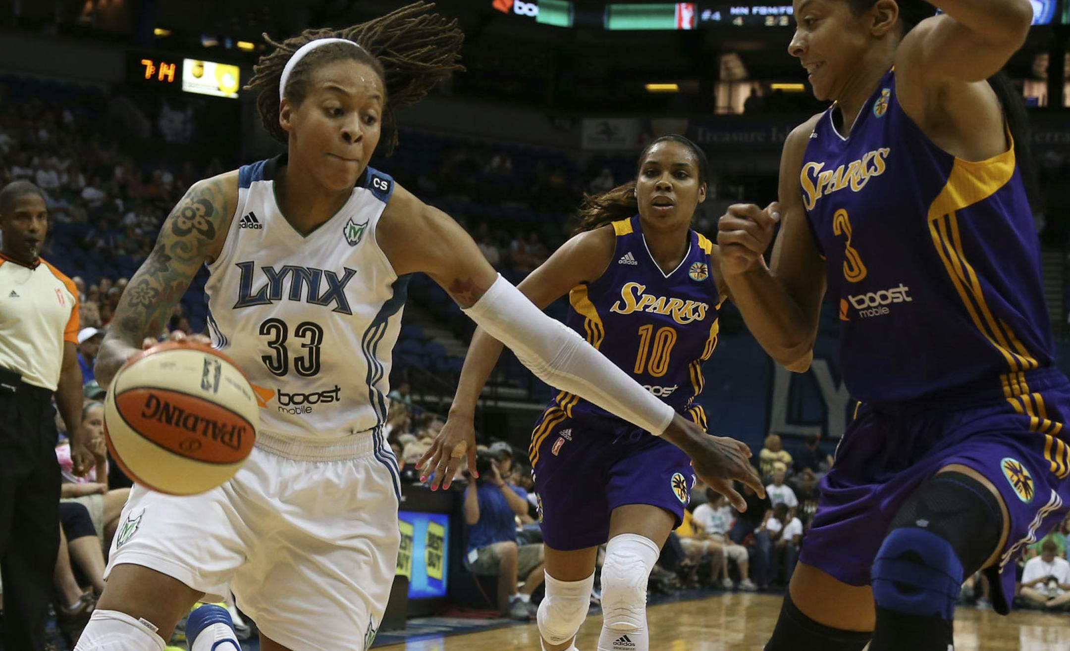 Lynx Seimone Augustus with Sparks Candace Parker defending drove to the basket during the first half at the Target Center in Minneapolis Min., Wednesday, September 4, 2013. ] (KYNDELL HARKNESS/STAR TRIBUNE) kyndell.harkness@startribune.com