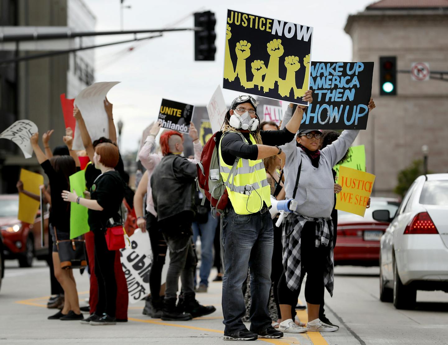 Protesters stood on Kellogg Blvd. in St. Paul on Tuesday. ] CARLOS GONZALEZ cgonzalez@startribune.com - September 6, 2016, St. Paul, MN, Protesters will rally at St. Paul City Hall/Ramsey County Court, Justice for Philando, Philando Castile