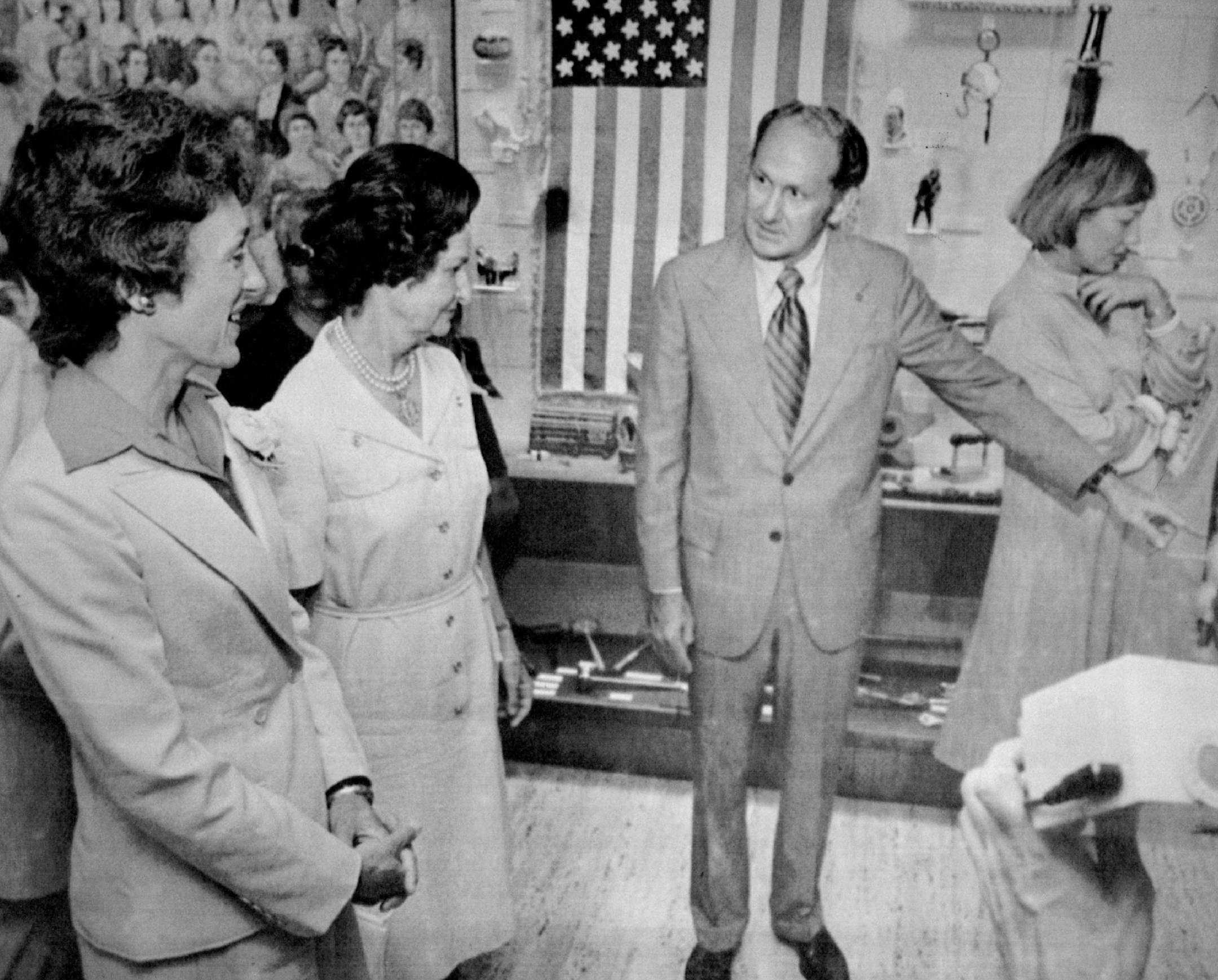July 28, 1977 Joan Mondale, wife of the vice president, was accompanied by former First Lady Lady Bird Johnson, center, on a tour of the Lyndon B. Johnson Library on the University of Texas campus in Austin. At right was Library Curator Gary Yarrington. Joan Mondale Visits LBJ Library -- Joan Mondale, left, wife of the vice president, accompanied by former first lady, Ladybird Johnson, as they toured the Lyndon B. Johnson Library in Austin Wednesday. Leading them on the tour is Gary Yarrington,