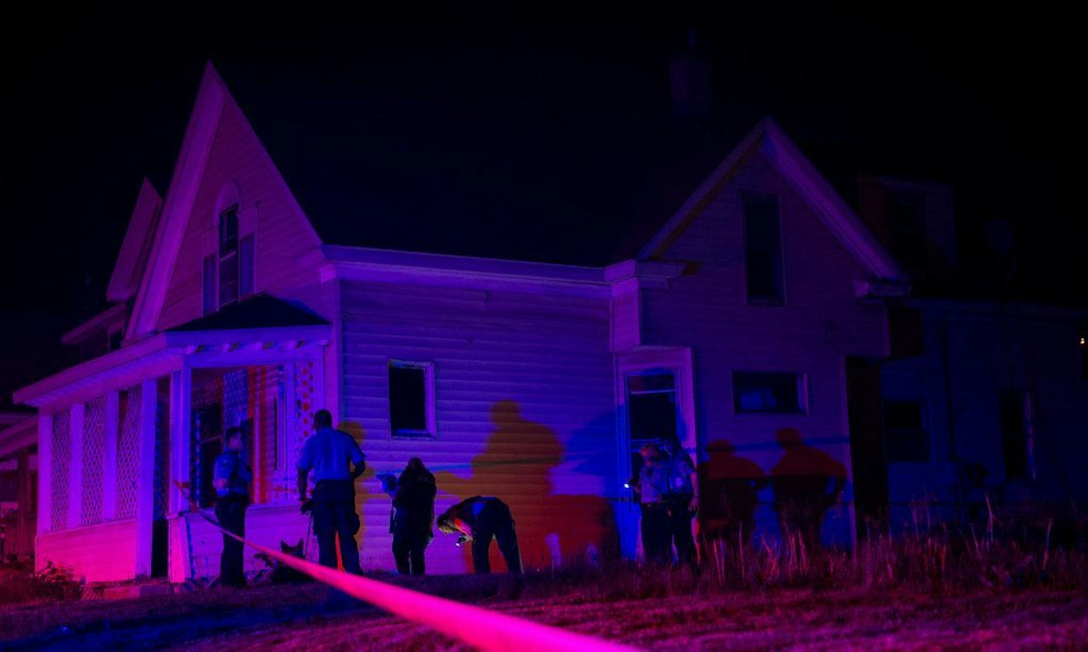 Police investigate a fatal shooting at Penn Avenue North and North 21st Avenue on Thursday, May 26, 2016 in Minneapolis, Minn.