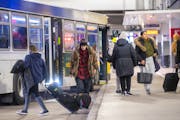 Commuters disembarked from buses Tuesday at the Mall of America Transit Station in Bloomington.