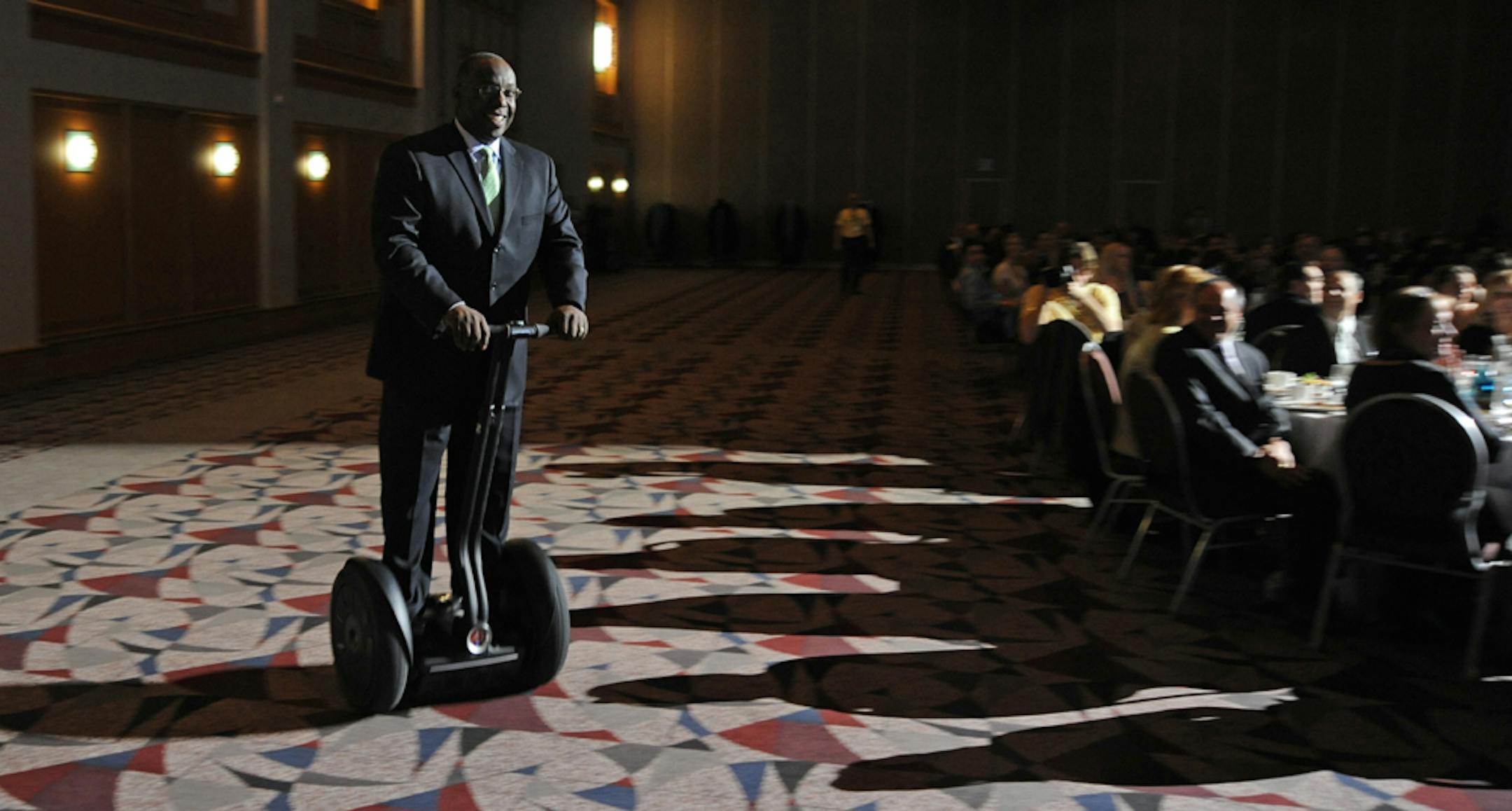 Melvin Tennant, the CEO of Meet Minneapolis, arrived at the Convention Center on a Segway before giving a recent speech.