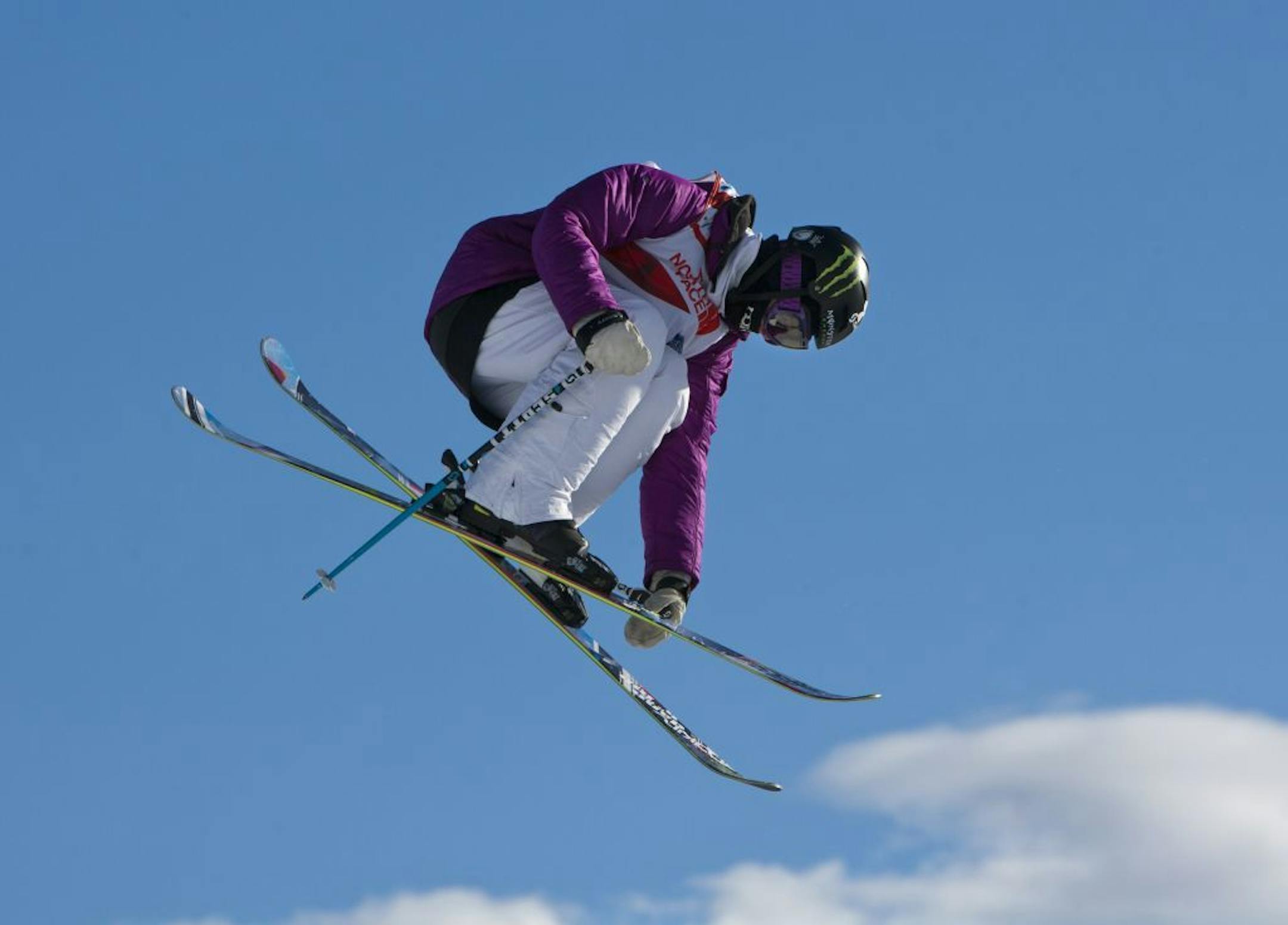 Slopestyle skier Keri Herman from Breckenridge, Colo. flies in the air with her skis at the Women's Slopestyle FIS Freestyle World Ski Championships at Park City, Utah on Thursday, Feb. 3, 2011. Herman placed third.