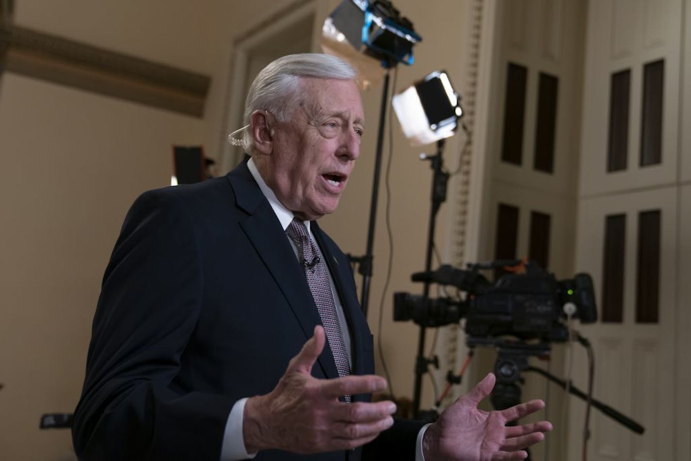 House Majority Leader Steny Hoyer, D-Md., does a tv news interview just outside the House Chamber prior a vote on an anti-hate resolution, an action sparked by controversial remarks from freshman Democrat Ilhan Omar, at the Capitol in Washington, Thursday, March 7, 2019.