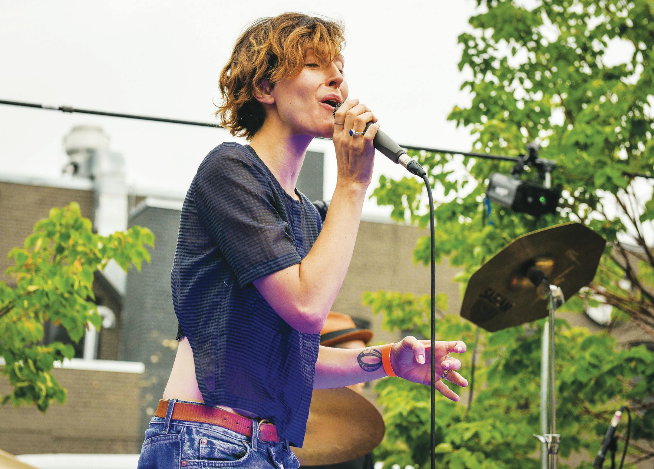 Channy Leaneagh singing during Warey's first official gig at the Totally Gross National Product party outside Icehouse in August.