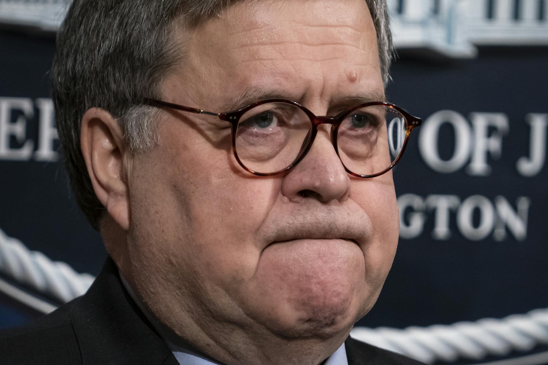 FILE - In this Jan. 13, 2020, file photo Attorney General William Barr speaks to reporters at the Justice Department in Washington to announce results of an investigation of the shootings at the Pensacola Naval Air Station in Florida. The Justice Department has placed a high national-security priority on its probe of the incident, insisting that investigators must get access to data from two locked and encrypted iPhones that belonged to the alleged gunman, a Saudi aviation student. (AP Photo/J.