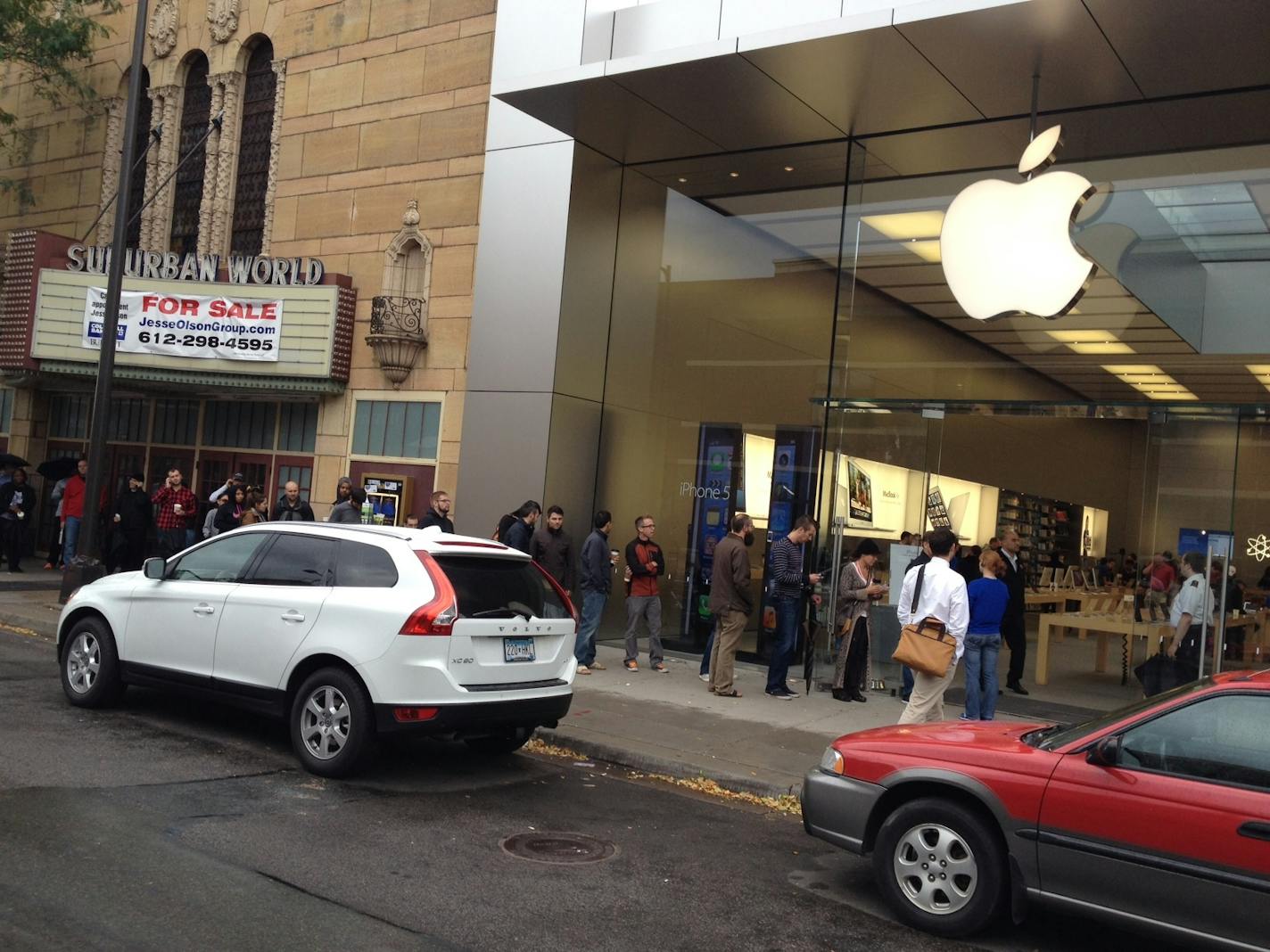 People lined up outside the Apple Store in Uptown Minneapolis early Friday for a chance to buy the new iPhone 5 just released today.