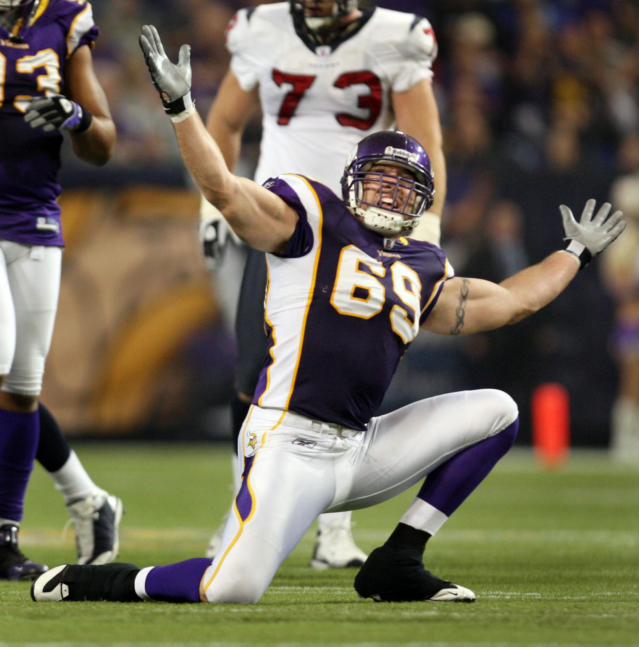 Jared Allen (69) celebrated after forcing a fumble in the second quarter. Minnesota beat Houston 28-21.