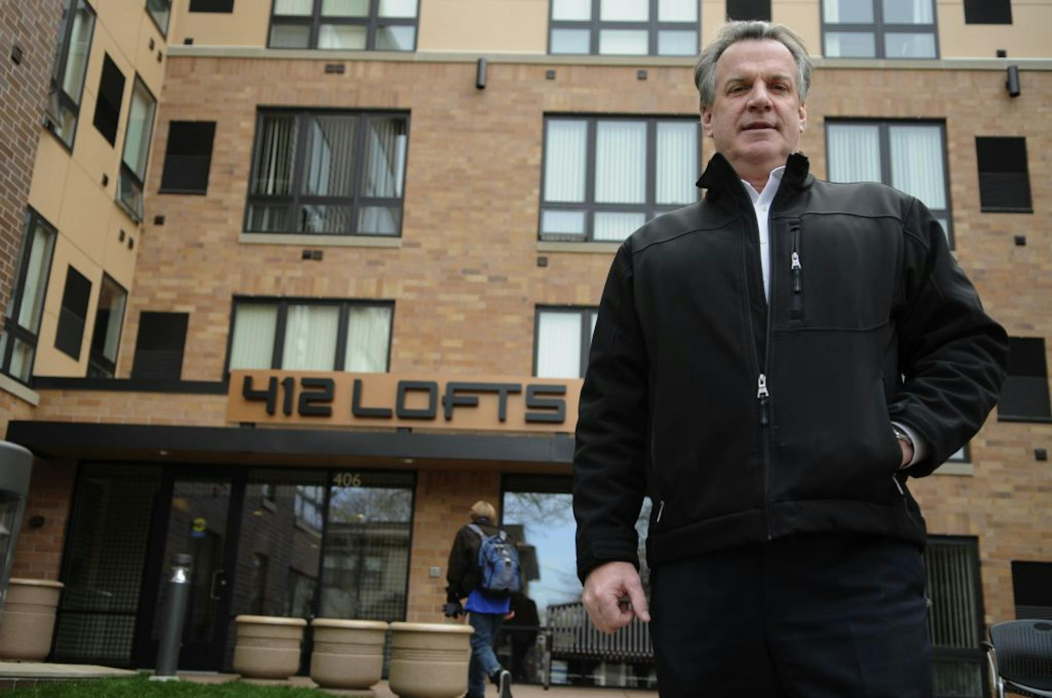 Kelly Doran with one of his latest projects, the 412 Lofts at 4th Street and 12th Avenue SE. in Minneapolis' Dinkytown neighborhood.