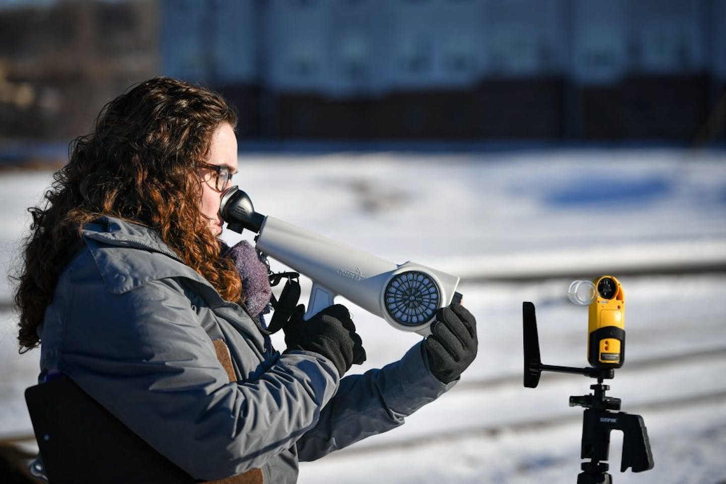 Sure to keep her eyes on her yellow Kestrel 5500 handheld weather station and wind speed meter, environmental engineer Jill Morris held her Nasal Ranger olfactometer perpendicular to the wind while she measured any odors and recorded what she found, about one mile from the Ramsey/ Washington County Recycling and Energy Center in Newport, MN.