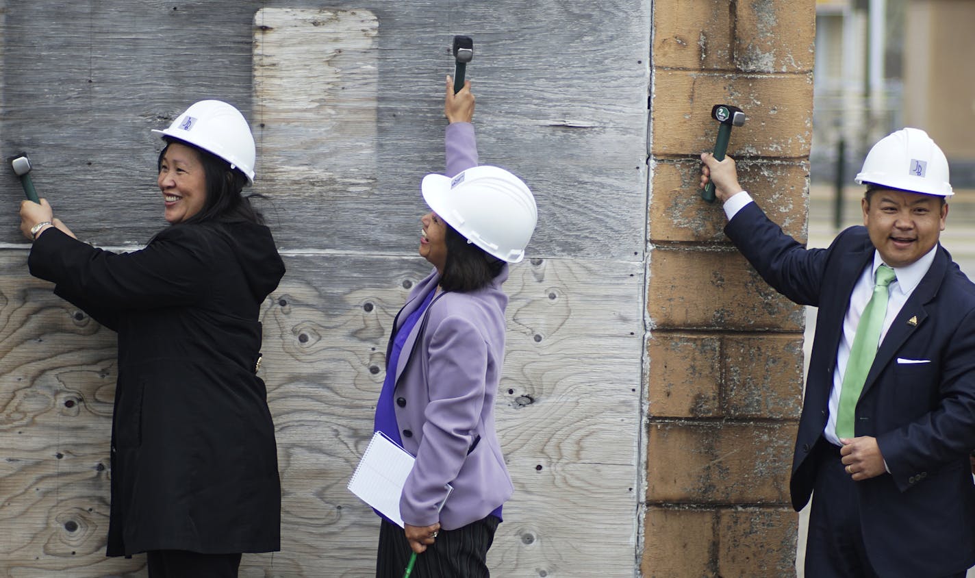 Bao Vang and Sue Bentley, Pres. and VP of Hmong American Partnership as well as Dai Thao, St. Paul City Councilman for Ward One officiated as demolition began at Little Mekong Plaza, a privately owned pubic space along the Green Line expected to become a key gathering place for the area's Hmong, Vietnamese and other immigrant communities. ] Richard Tsong-Taatarii/rtsong-taatarii@startribune.com